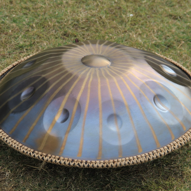 Gold handpan with sun motif